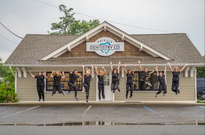 Ocean Dentistry Team Celebrating Dental Office