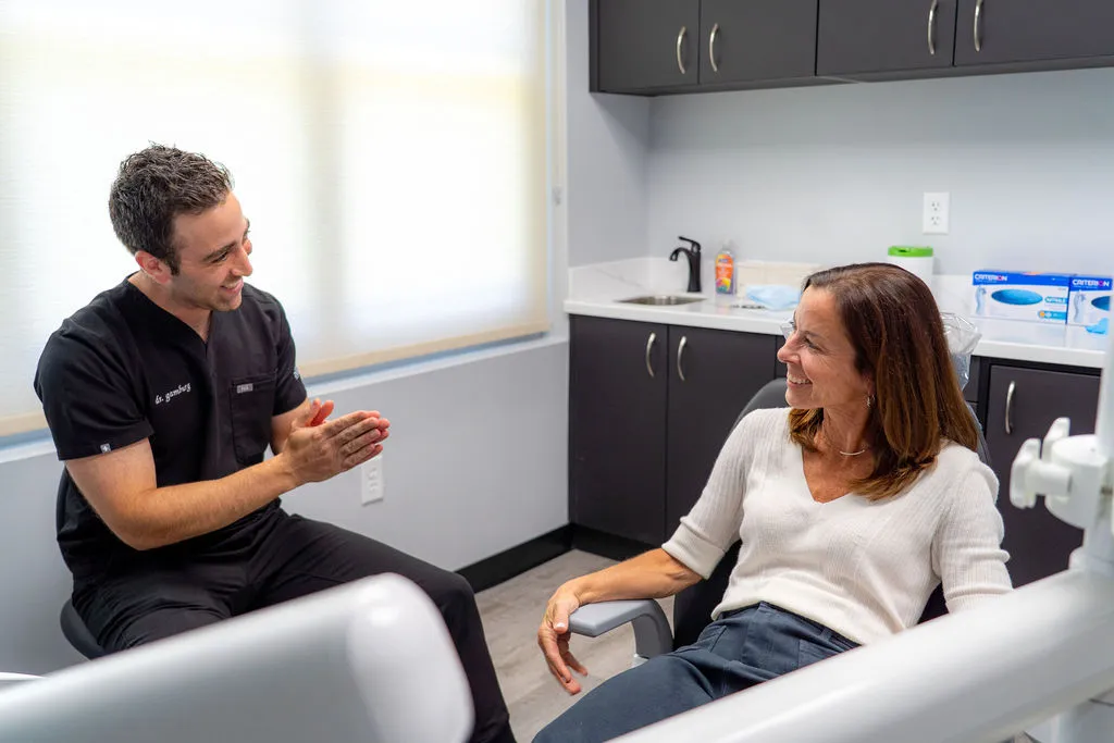 Dentist discussing Toothache Pain in Ocean Township NJ